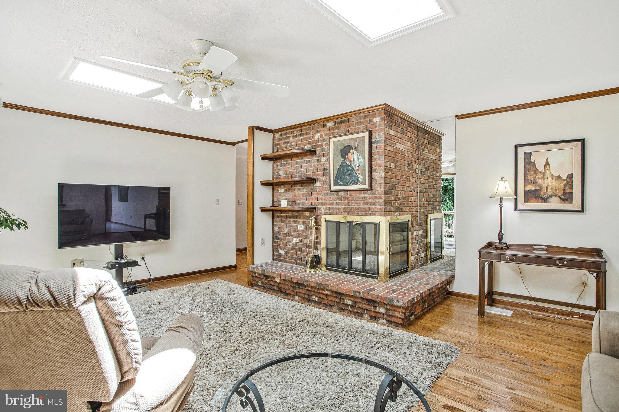 1021 Carson Drive Huntingtown, MD 20639 - Photo 12 of 33 a living room with furniture and a flat screen tv