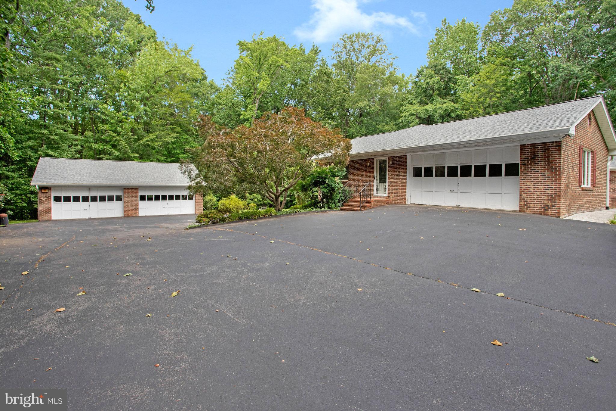 1021 Carson Drive Huntingtown, MD 20639 - Photo 31 of 33 a view of a house with a garage