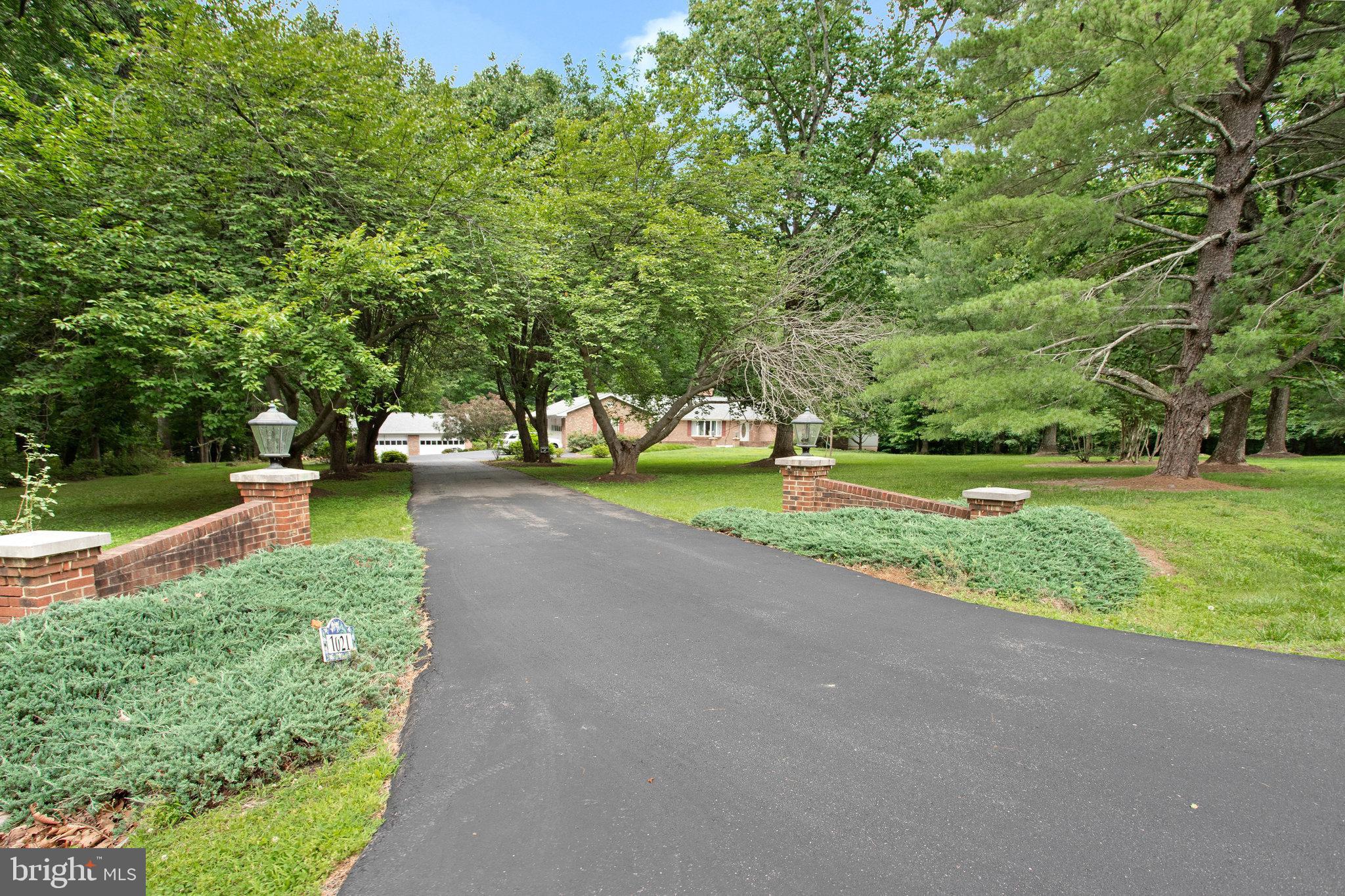 1021 Carson Drive Huntingtown, MD 20639 - Photo 32 of 33 a view of a park with large trees
