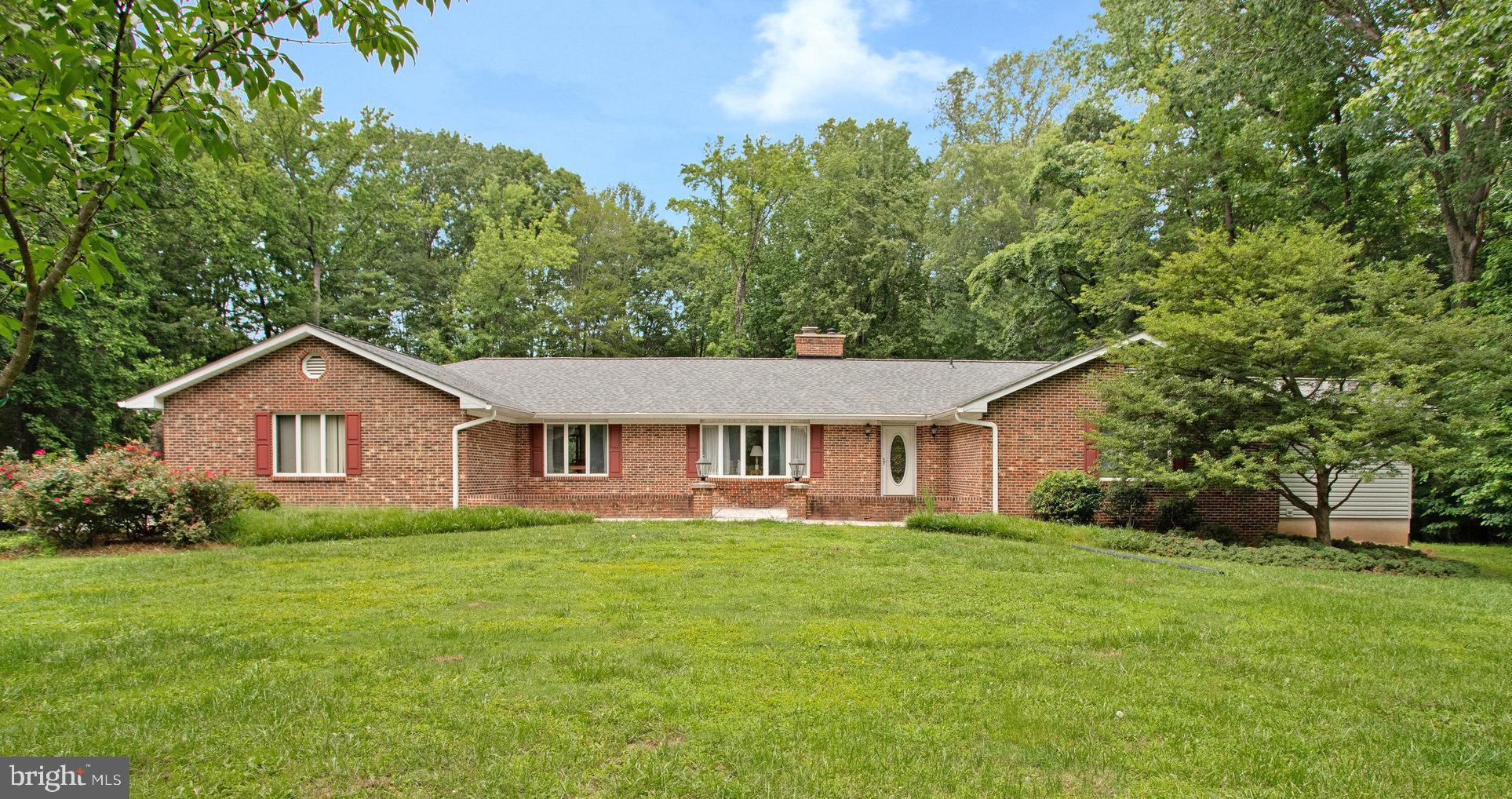1021 Carson Drive Huntingtown, MD 20639 - Photo 33 of 33 front view of house with a yard