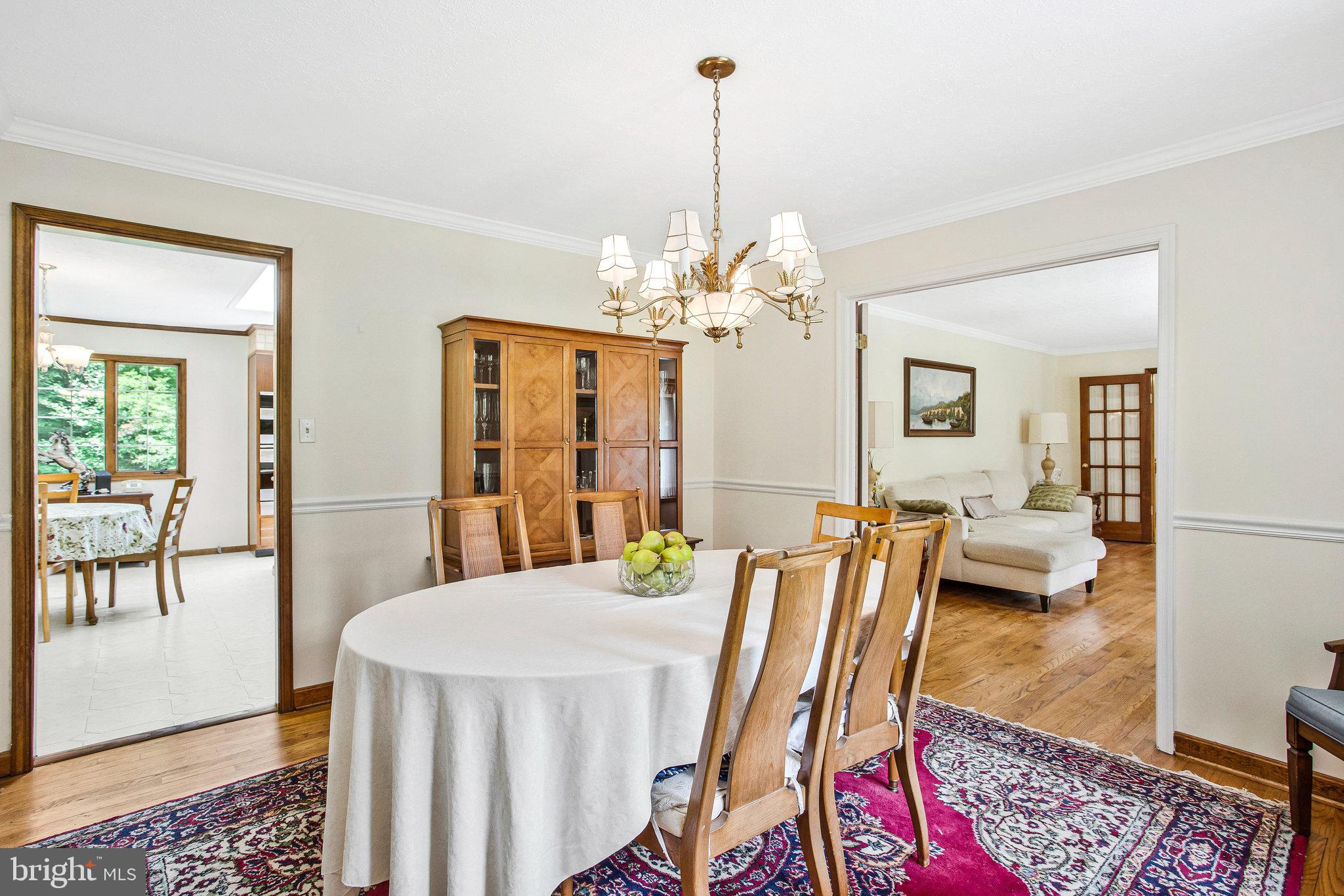 1021 Carson Drive Huntingtown, MD 20639 - Photo 9 of 33 a view of a dining room with furniture and wooden floor