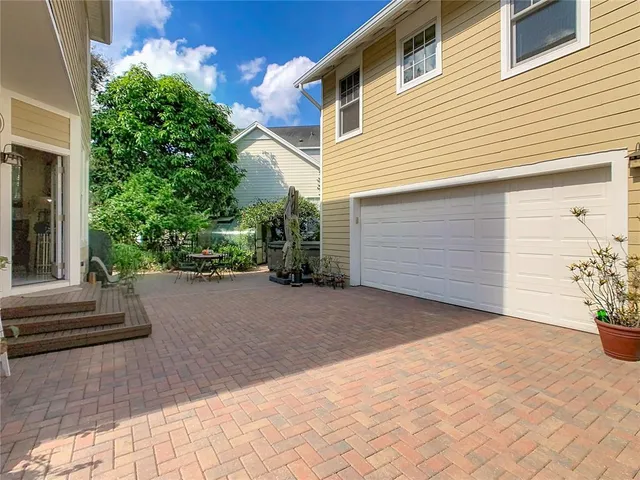 a view of entryway and hall with dining room