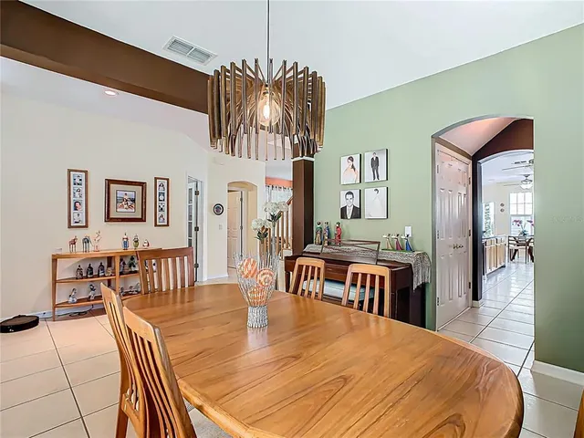 a work room with furniture and a window
