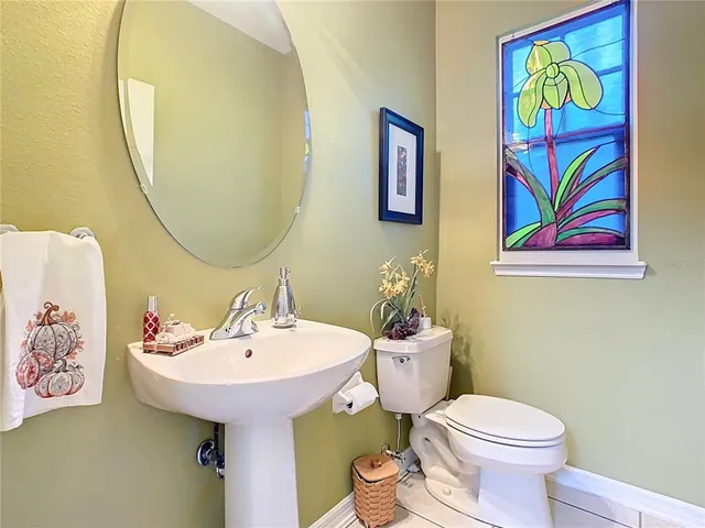 a bathroom with a sink and a window