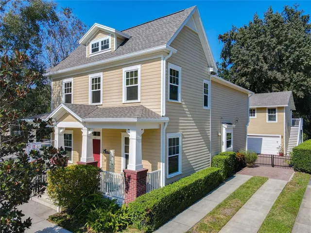 an aerial view of a house with a garden