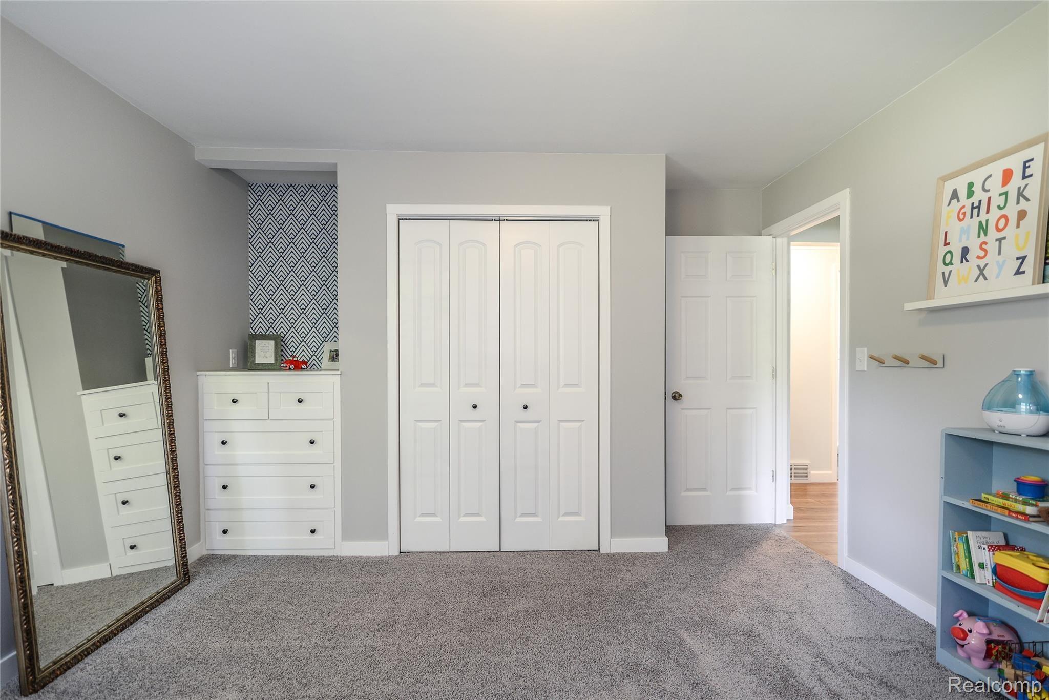 3855 Mason Road Howell, MI 48843 - Photo 20 of 28 Charming Built-Ins with Custom Closet Shelfs