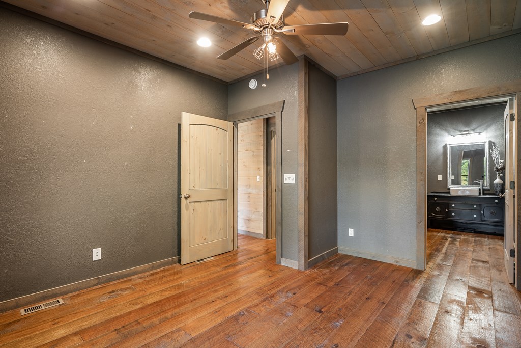 2637 River Road Mineral Bluff, GA 30559 - Photo 16 of 67 a view of a livingroom with a chandelier