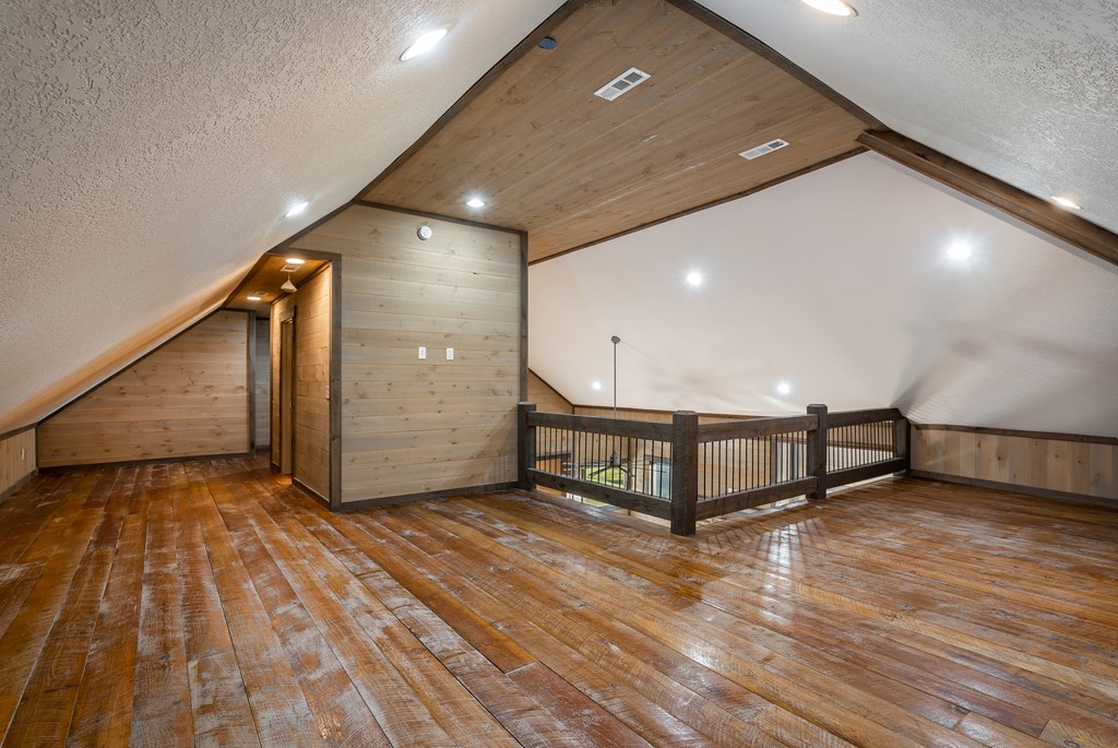 2637 River Road Mineral Bluff, GA 30559 - Photo 24 of 67 a view of an empty room with wooden floor