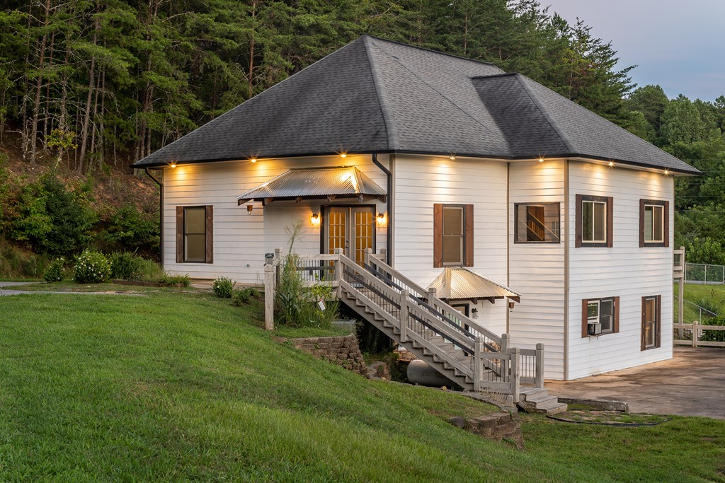 2637 River Road Mineral Bluff, GA 30559 - Photo 4 of 67 a view of house with backyard