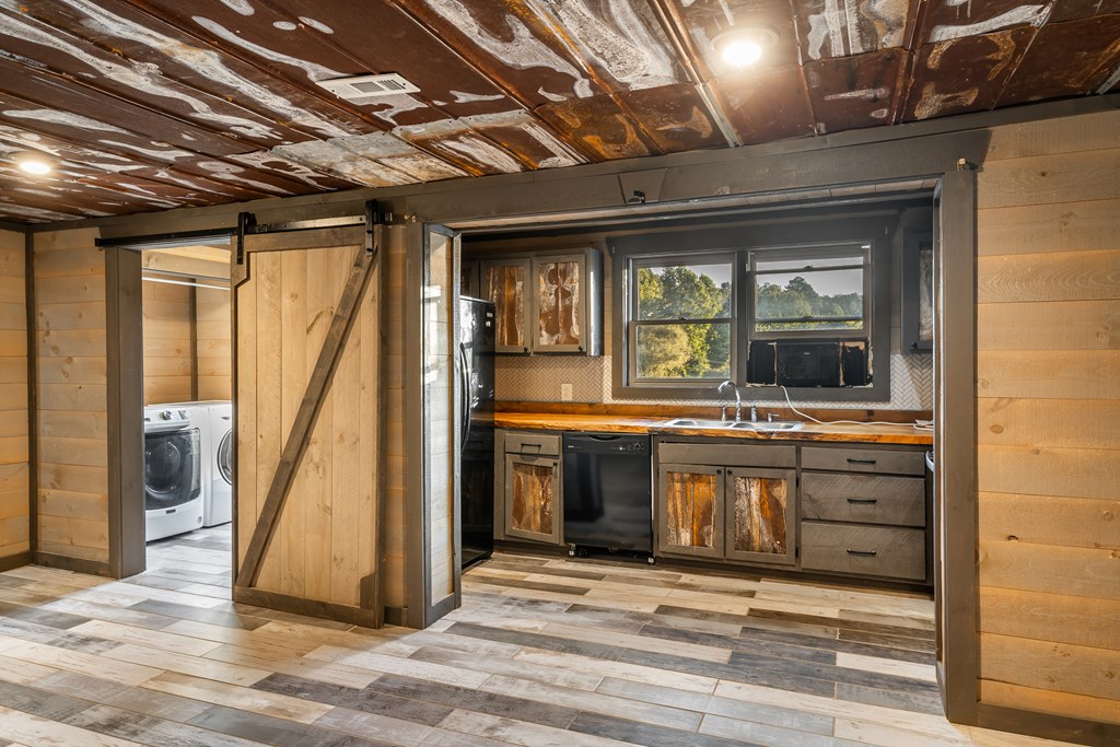 2637 River Road Mineral Bluff, GA 30559 - Photo 41 of 67 a view of a hallway with wooden floor and a fireplace