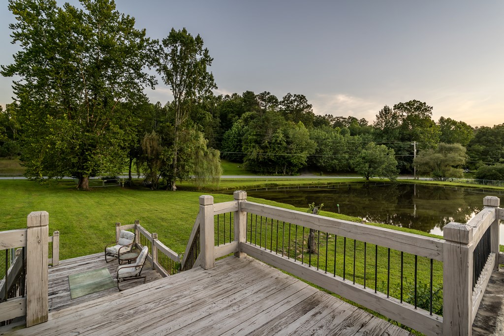 2637 River Road Mineral Bluff, GA 30559 - Photo 52 of 67 a view of a lake with a deck