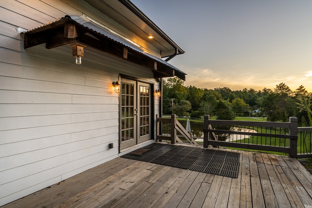 2637 River Road Mineral Bluff, GA 30559 - Photo 55 of 67 a view of balcony with wooden floor and outdoor seating