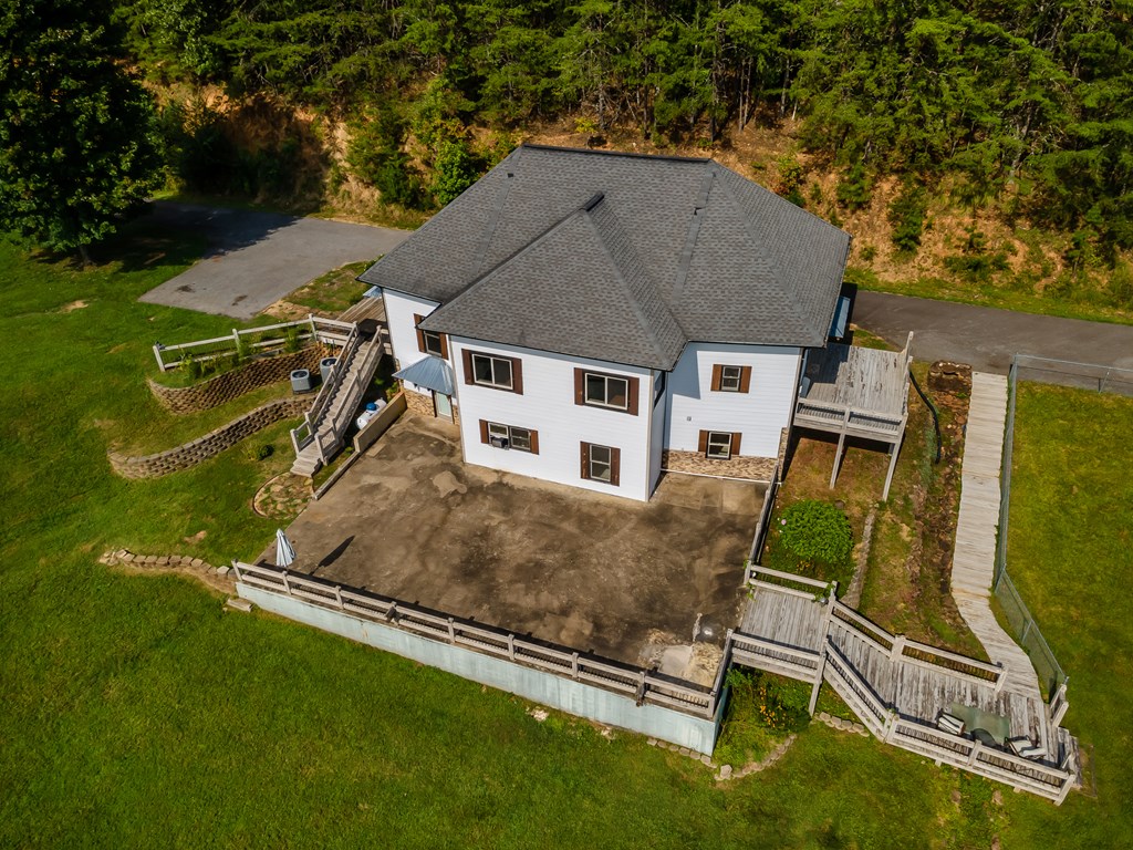 2637 River Road Mineral Bluff, GA 30559 - Photo 57 of 67 an aerial view of a house with table and chairs