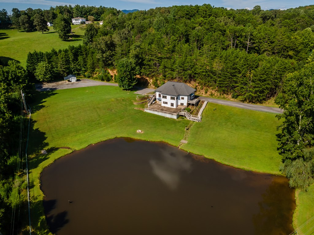 2637 River Road Mineral Bluff, GA 30559 - Photo 66 of 67 a view of a lake with a big yard