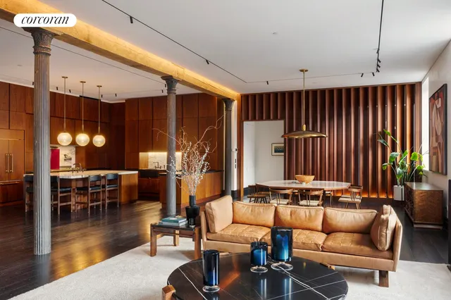 a dining room with furniture window and wooden floor