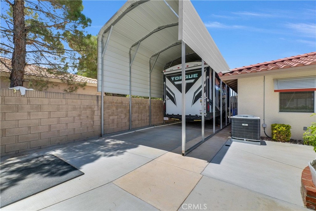 13931 Falling Leaf Road Apple Valley, CA 92307 - Photo 37 of 50 Covered RV parking area