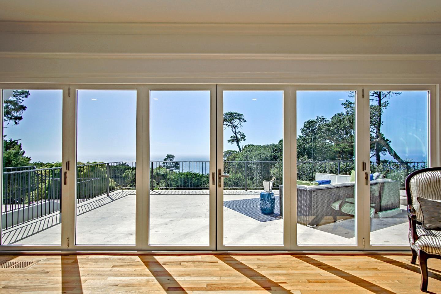 21 Mentone Road Carmel, CA 93923 - Photo 14 of 80 a view of a floor to ceiling window and a room