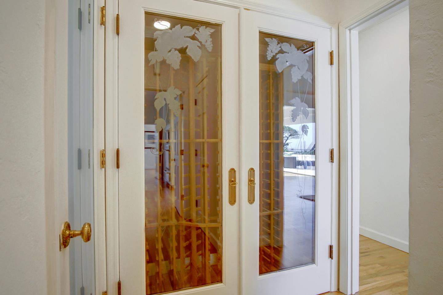 21 Mentone Road Carmel, CA 93923 - Photo 25 of 80 a view of a bathroom from a hallway