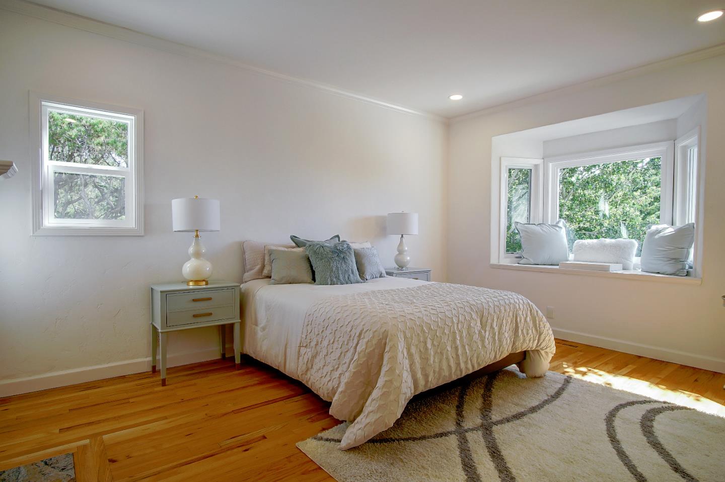 21 Mentone Road Carmel, CA 93923 - Photo 37 of 80 a bedroom with a bed and window