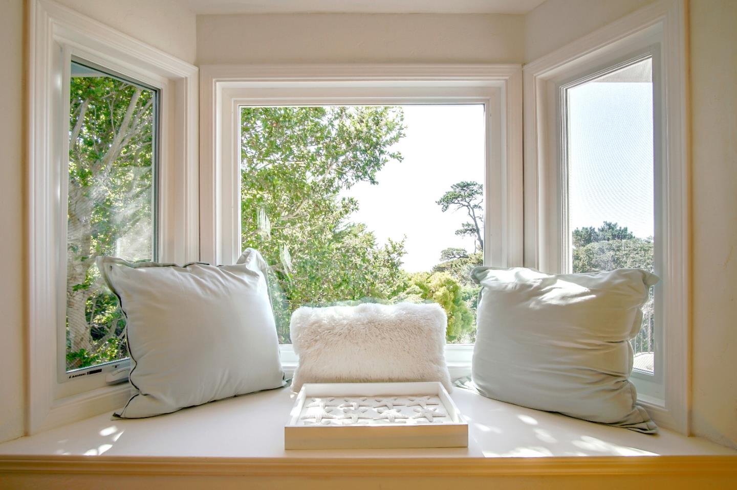 21 Mentone Road Carmel, CA 93923 - Photo 38 of 80 a view of a couch in front of a window