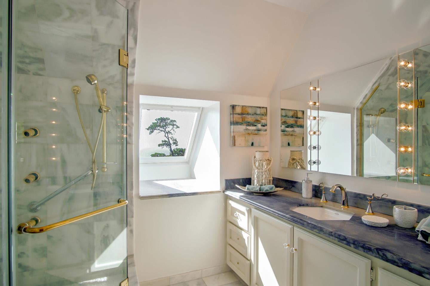 21 Mentone Road Carmel, CA 93923 - Photo 46 of 80 a bathroom with a granite countertop shower sink and mirror