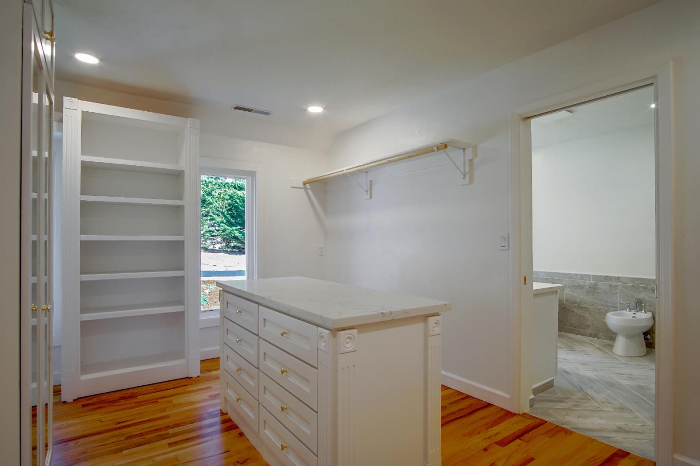 21 Mentone Road Carmel, CA 93923 - Photo 55 of 80 a view of walk in closet with empty racks