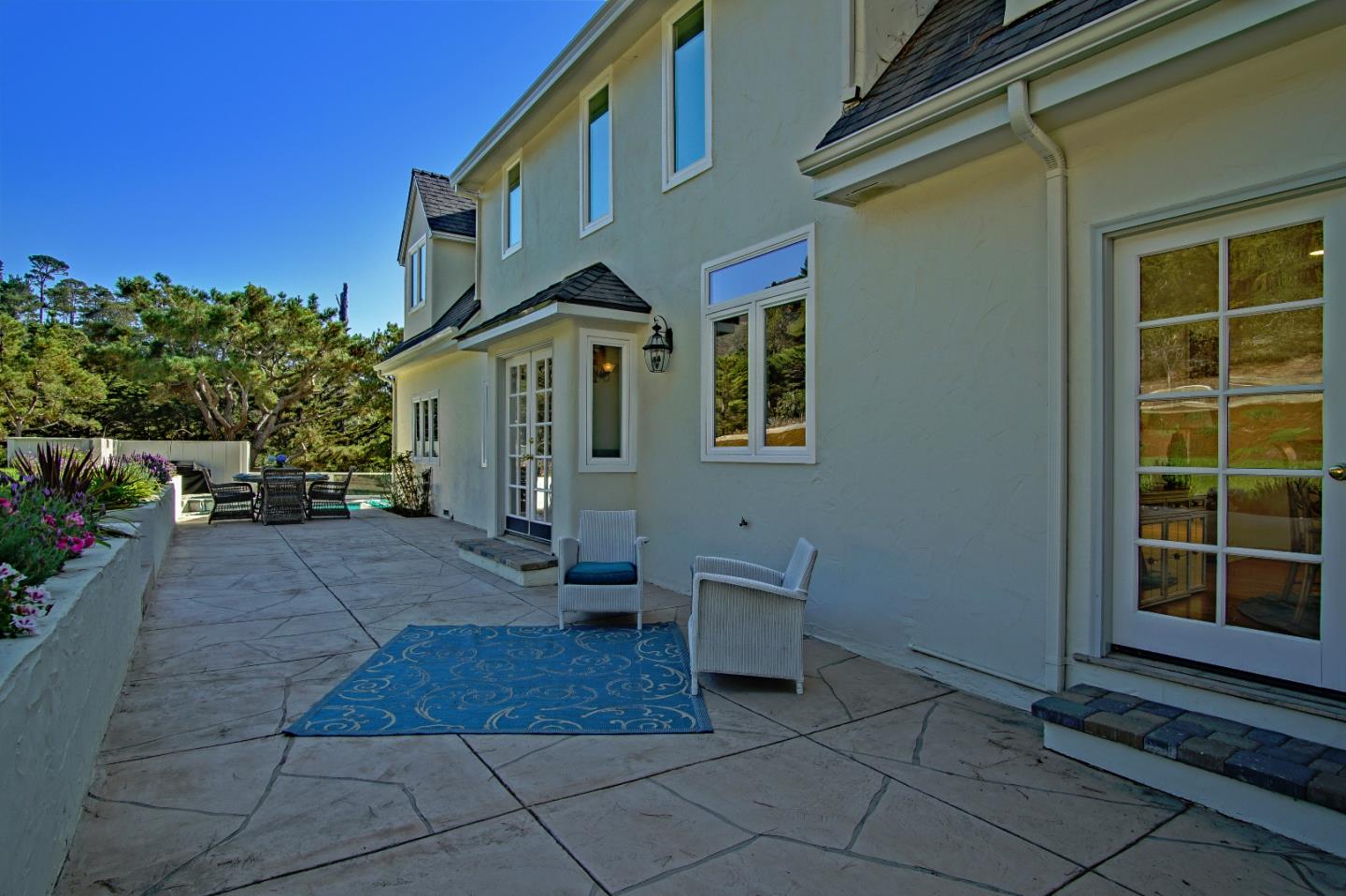 21 Mentone Road Carmel, CA 93923 - Photo 61 of 80 a front view of a house with a yard