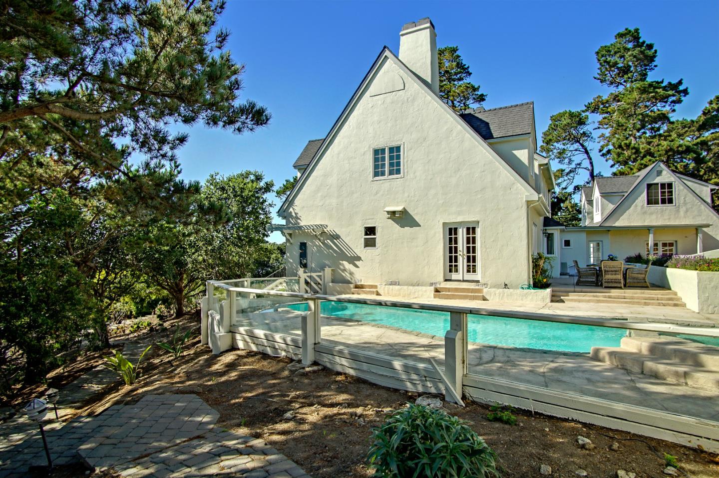 21 Mentone Road Carmel, CA 93923 - Photo 70 of 80 a view of a house with backyard and sitting area