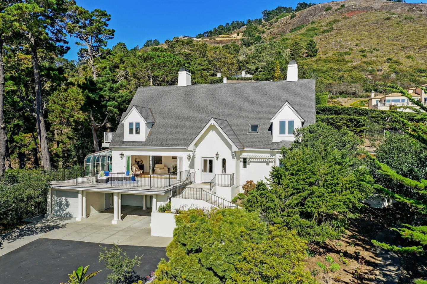 21 Mentone Road Carmel, CA 93923 - Photo 77 of 80 an aerial view of a house with a yard and potted plants