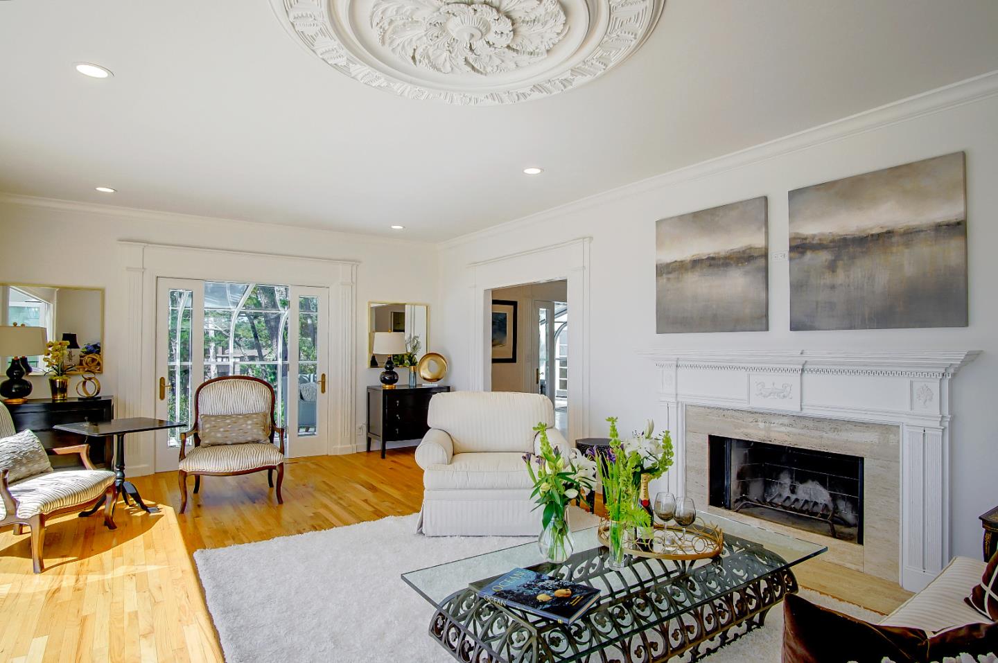 21 Mentone Road Carmel, CA 93923 - Photo 9 of 80 a living room with furniture a fireplace and a table