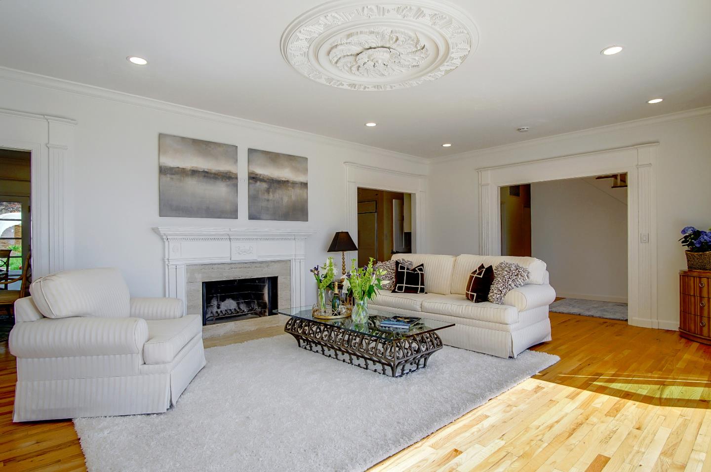 21 Mentone Road Carmel, CA 93923 - Photo 10 of 80 a living room with furniture and a fireplace