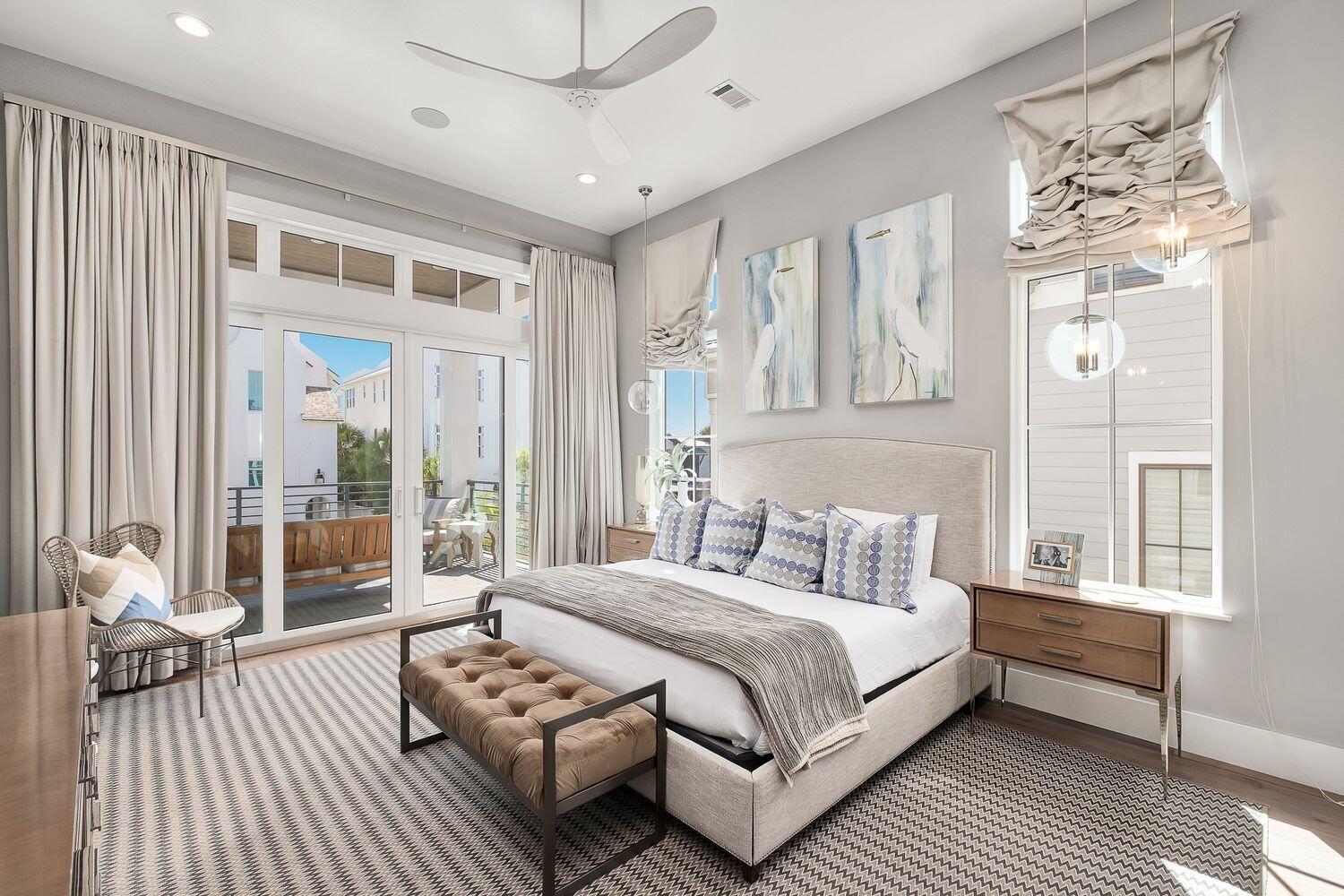 2657 East County Highway 30A Santa Rosa Beach, FL 32459 - Photo 13 of 59 a bedroom with a bed wooden floor and window