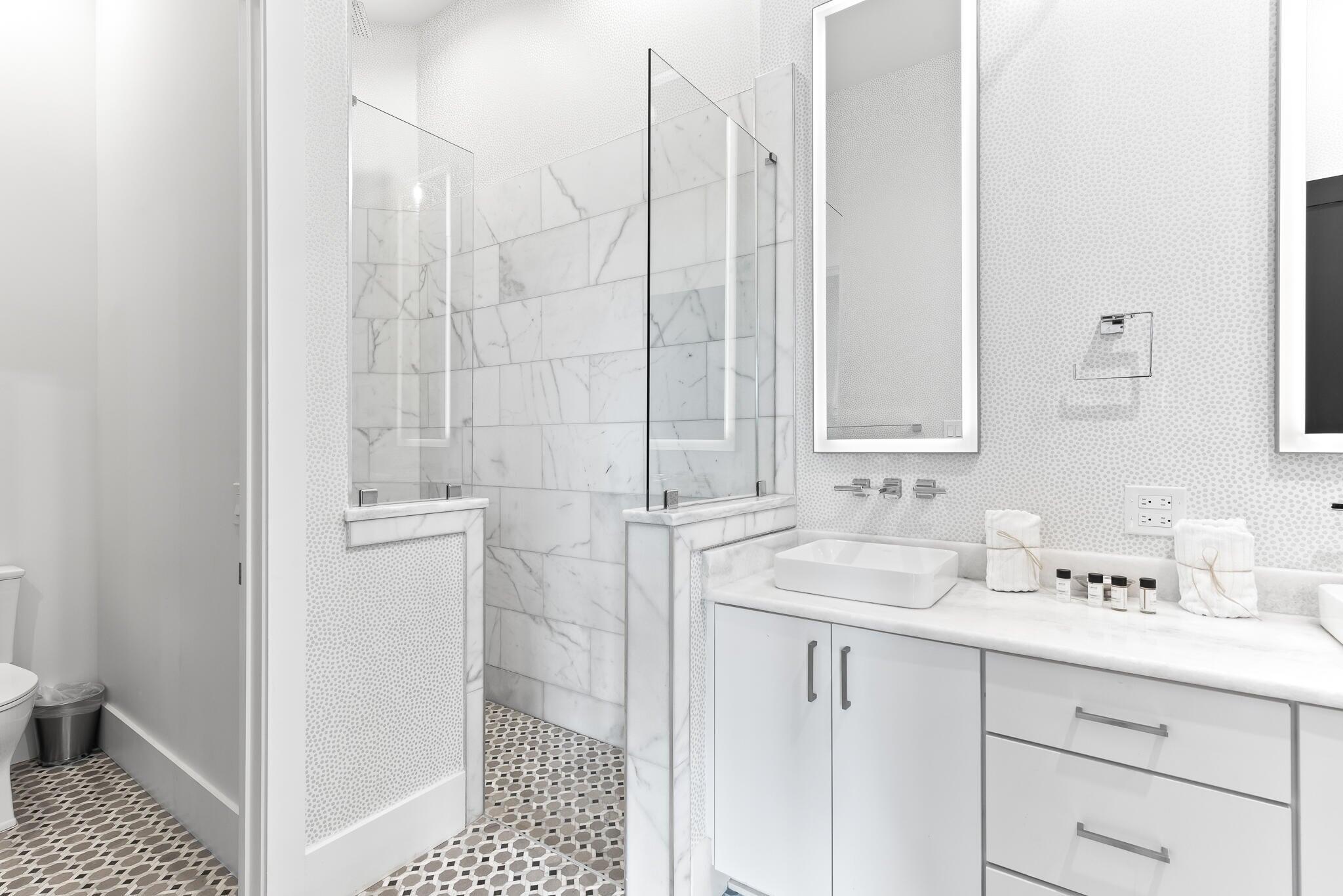 2657 East County Highway 30A Santa Rosa Beach, FL 32459 - Photo 17 of 59 a bathroom with a sink and a mirror