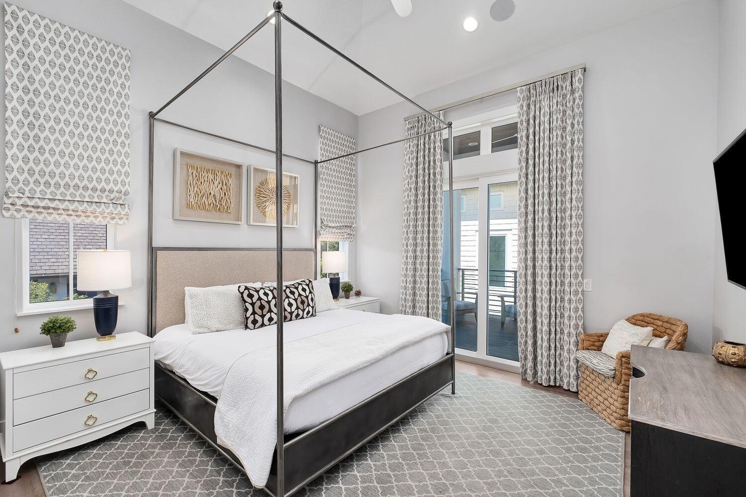 2657 East County Highway 30A Santa Rosa Beach, FL 32459 - Photo 20 of 59 a bedroom with a bed and wooden floor