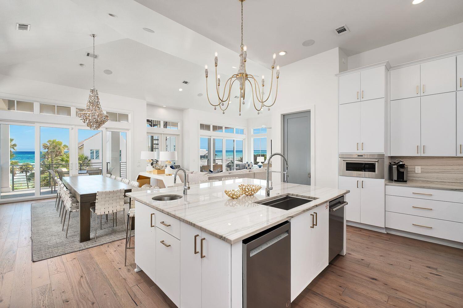 2657 East County Highway 30A Santa Rosa Beach, FL 32459 - Photo 2 of 59 a kitchen that has a lot of cabinets in it