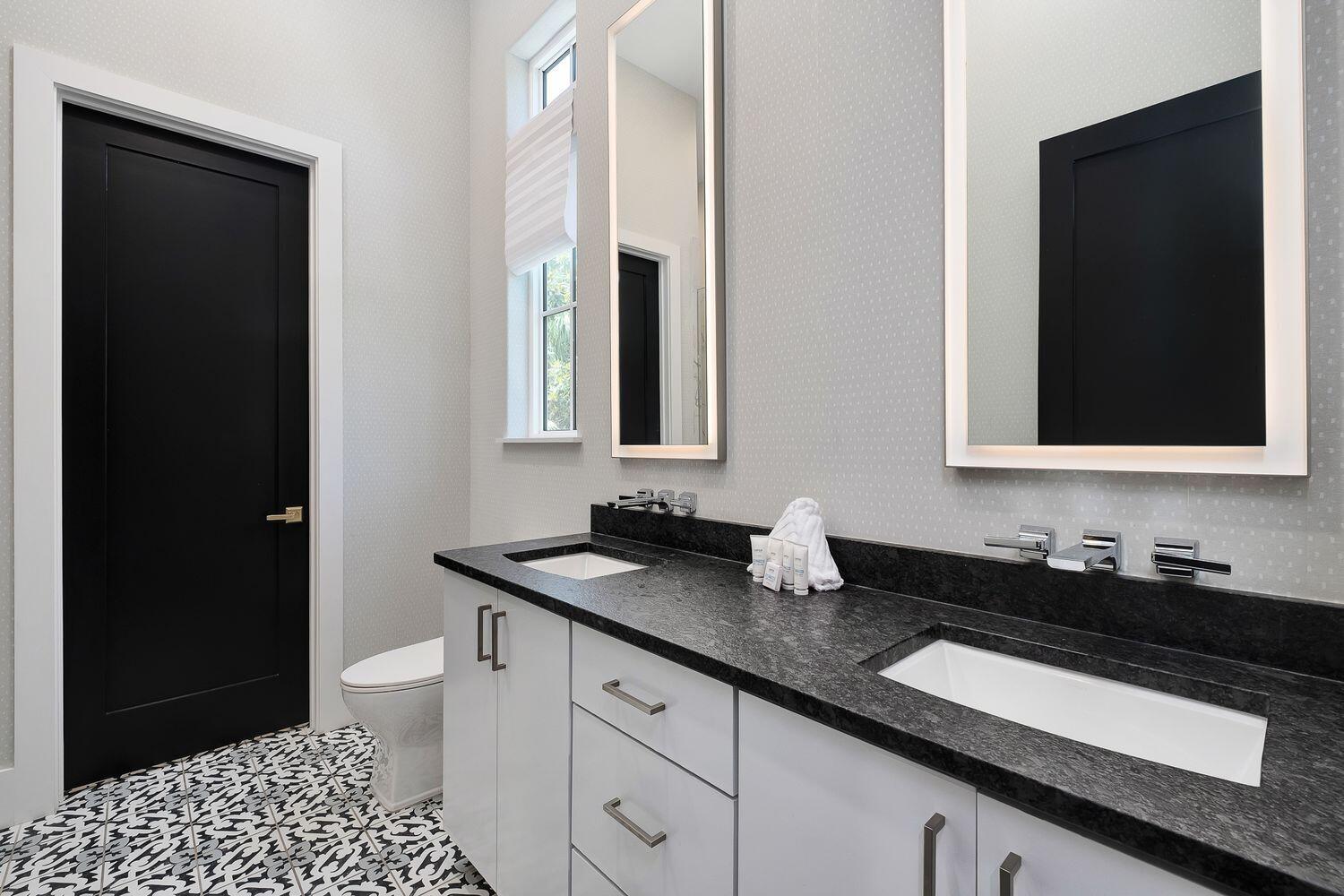 2657 East County Highway 30A Santa Rosa Beach, FL 32459 - Photo 29 of 59 a bathroom with a sink and a mirror