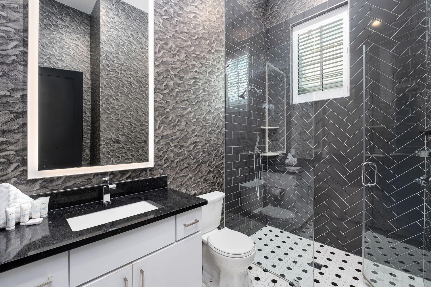 2657 East County Highway 30A Santa Rosa Beach, FL 32459 - Photo 34 of 59 a bathroom with a sink a toilet and shower