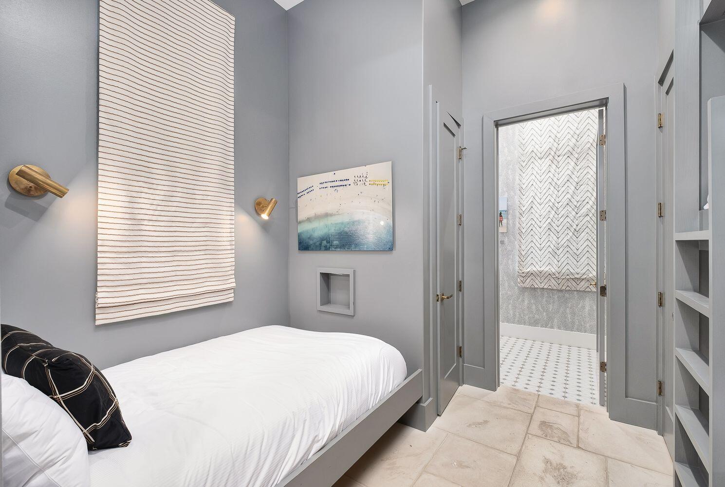 2657 East County Highway 30A Santa Rosa Beach, FL 32459 - Photo 41 of 59 a bedroom with a bed and a window