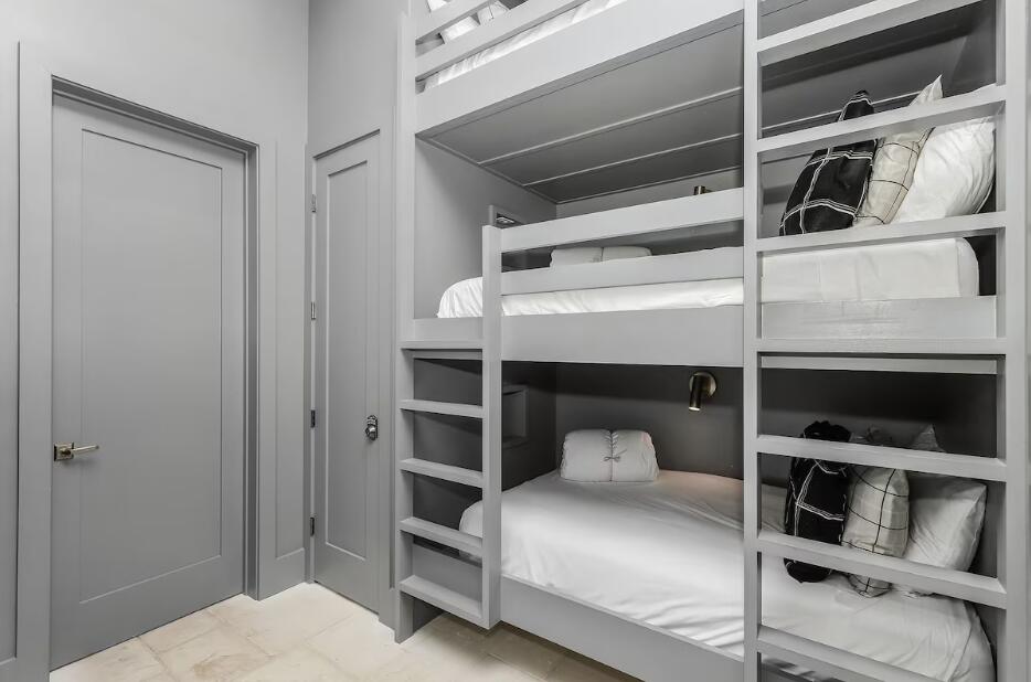 2657 East County Highway 30A Santa Rosa Beach, FL 32459 - Photo 42 of 59 a bedroom with a bed and a closet