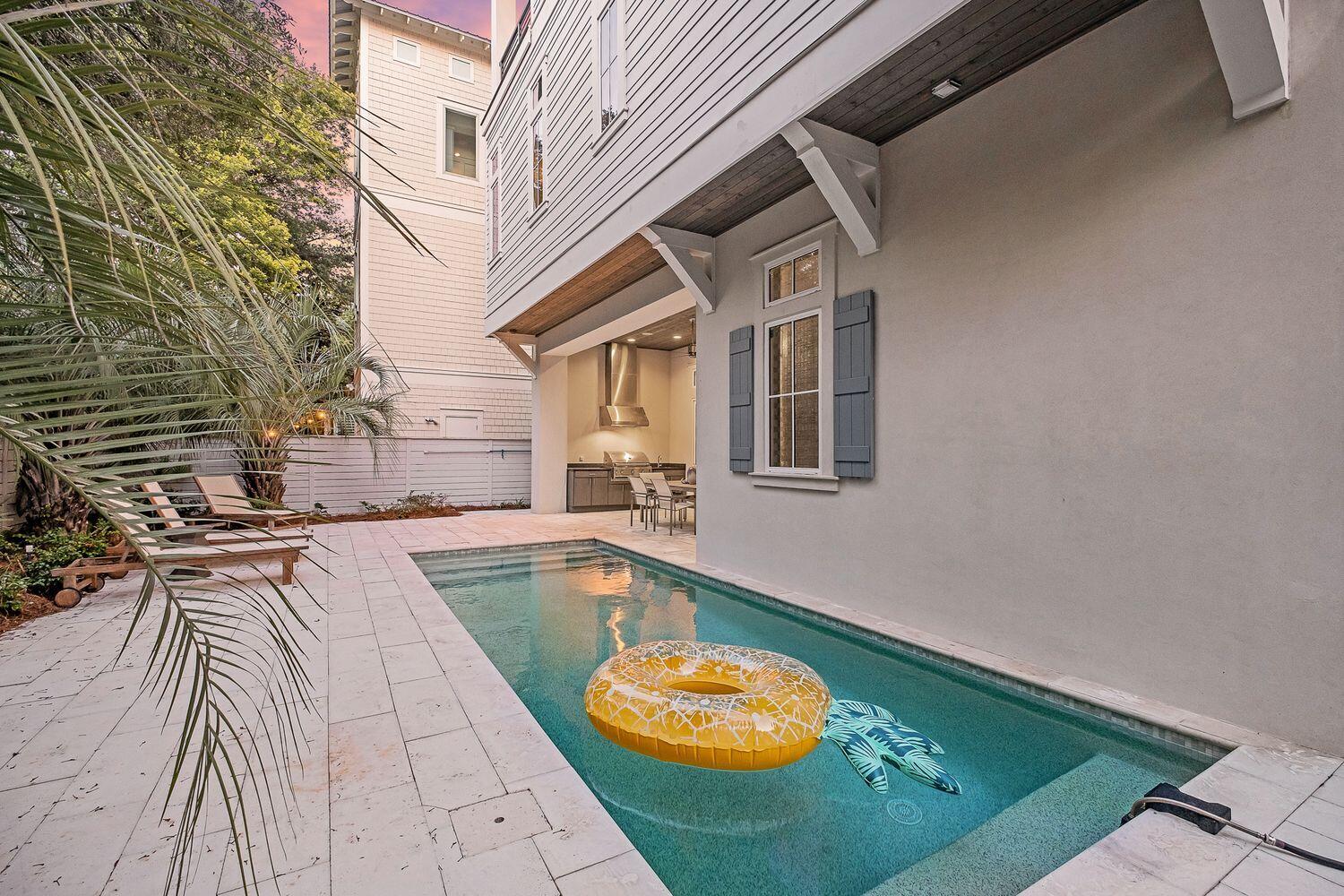2657 East County Highway 30A Santa Rosa Beach, FL 32459 - Photo 47 of 59 a view of a swimming pool with a lounge chairs