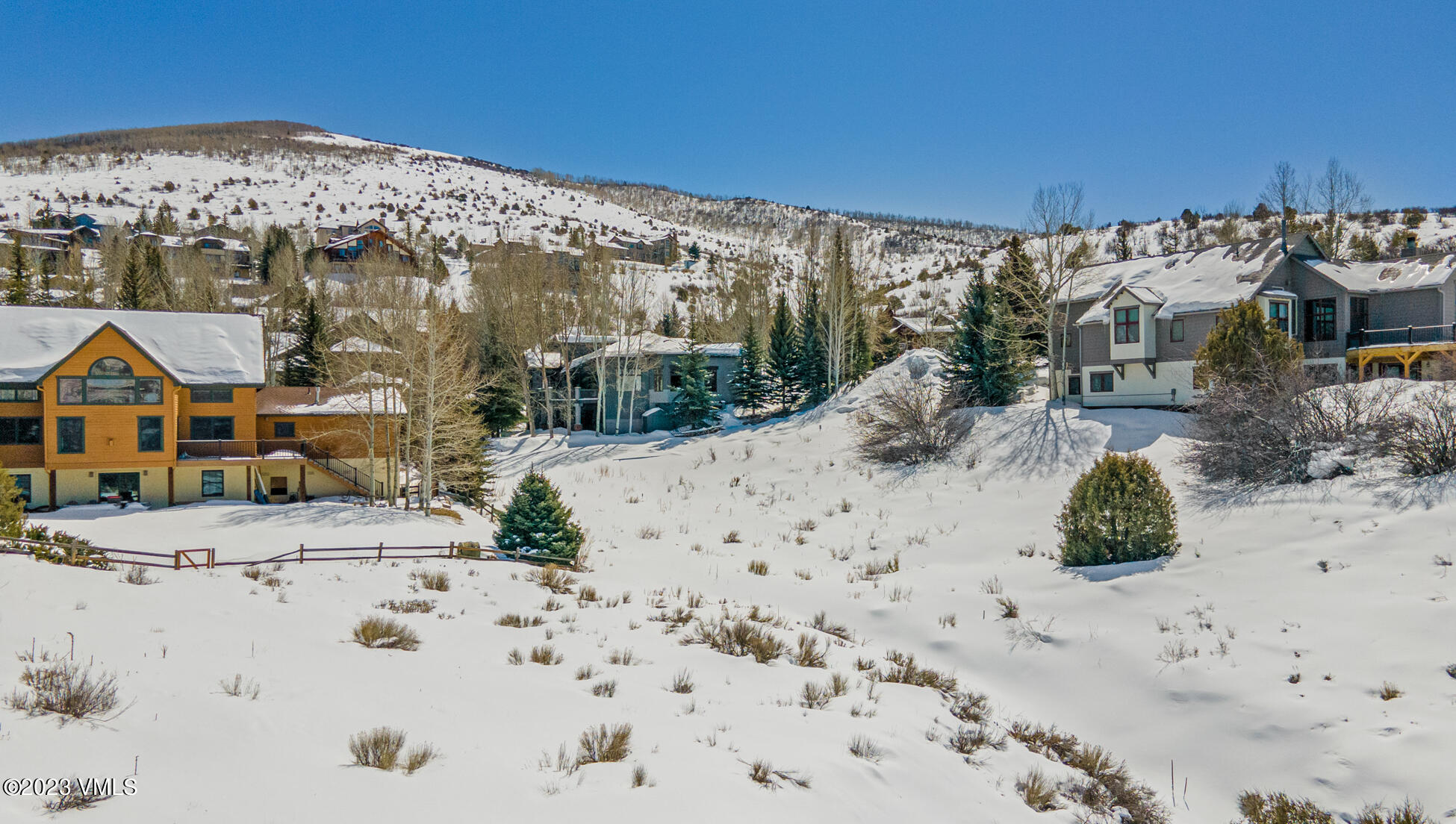 237 Remington Trail Edwards, CO 81632 - Photo 6 of 19 a view of roof with wooden fence