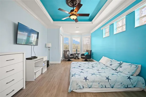 a bed room with a bed and a couch