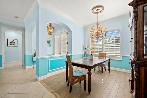 a room with washing machine and window