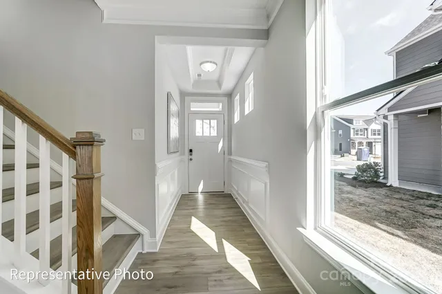 a view of a hallway with a window
