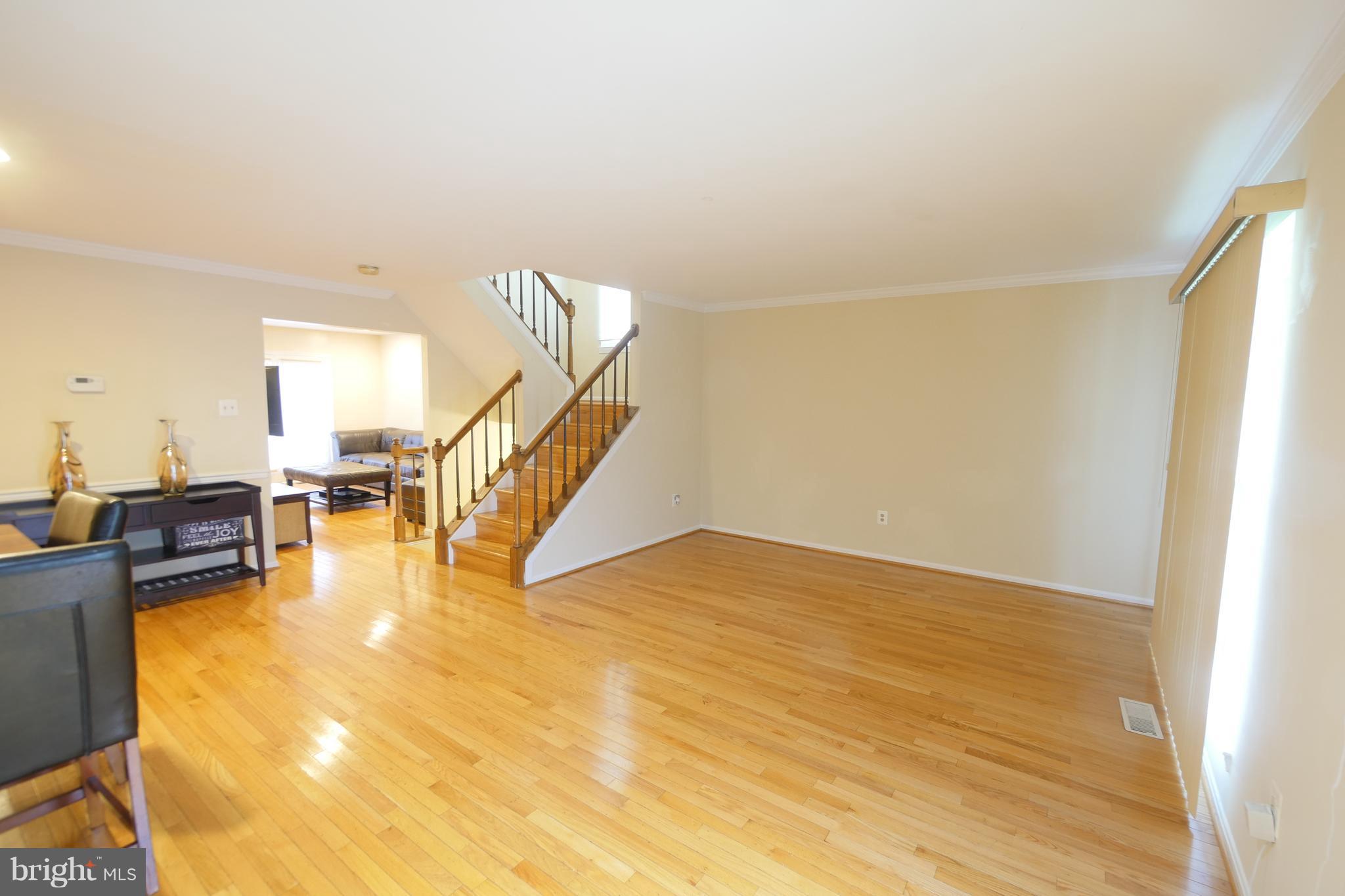 15024 Shamrock Ridge Road Silver Spring, MD 20906 - Photo 2 of 30 Living room with refinished hardwoods