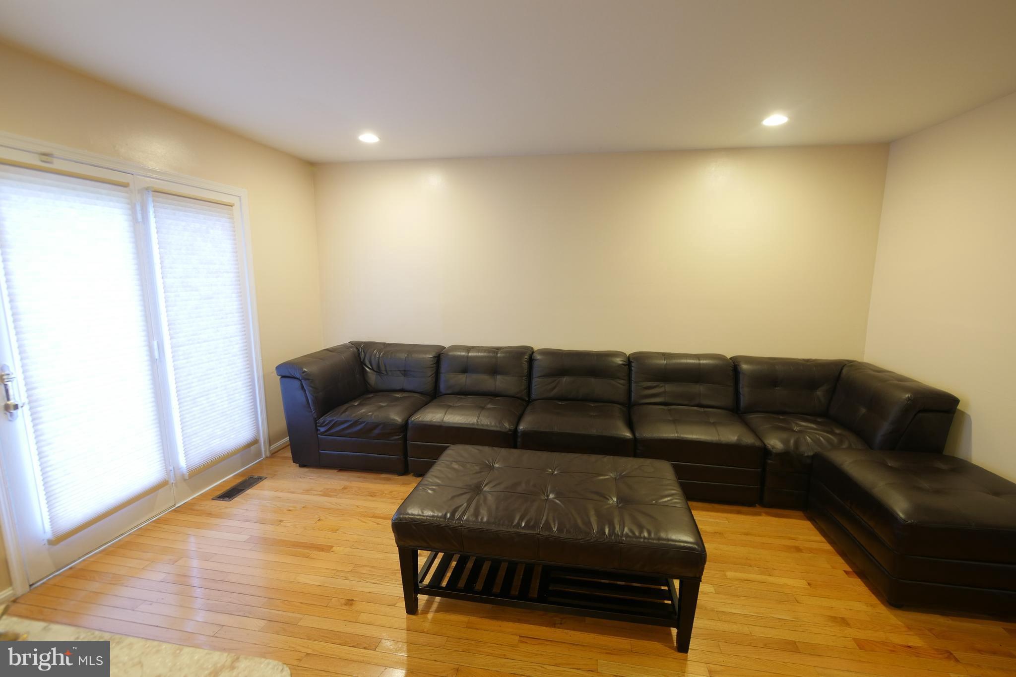 15024 Shamrock Ridge Road Silver Spring, MD 20906 - Photo 6 of 30 Family Room Leading to backyard