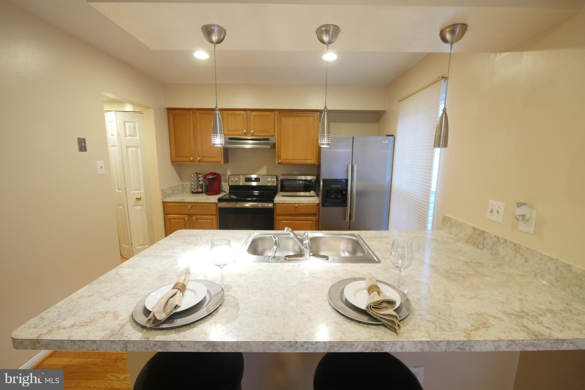 15024 Shamrock Ridge Road Silver Spring, MD 20906 - Photo 8 of 30 Upgraded kitchen appliances and counter top