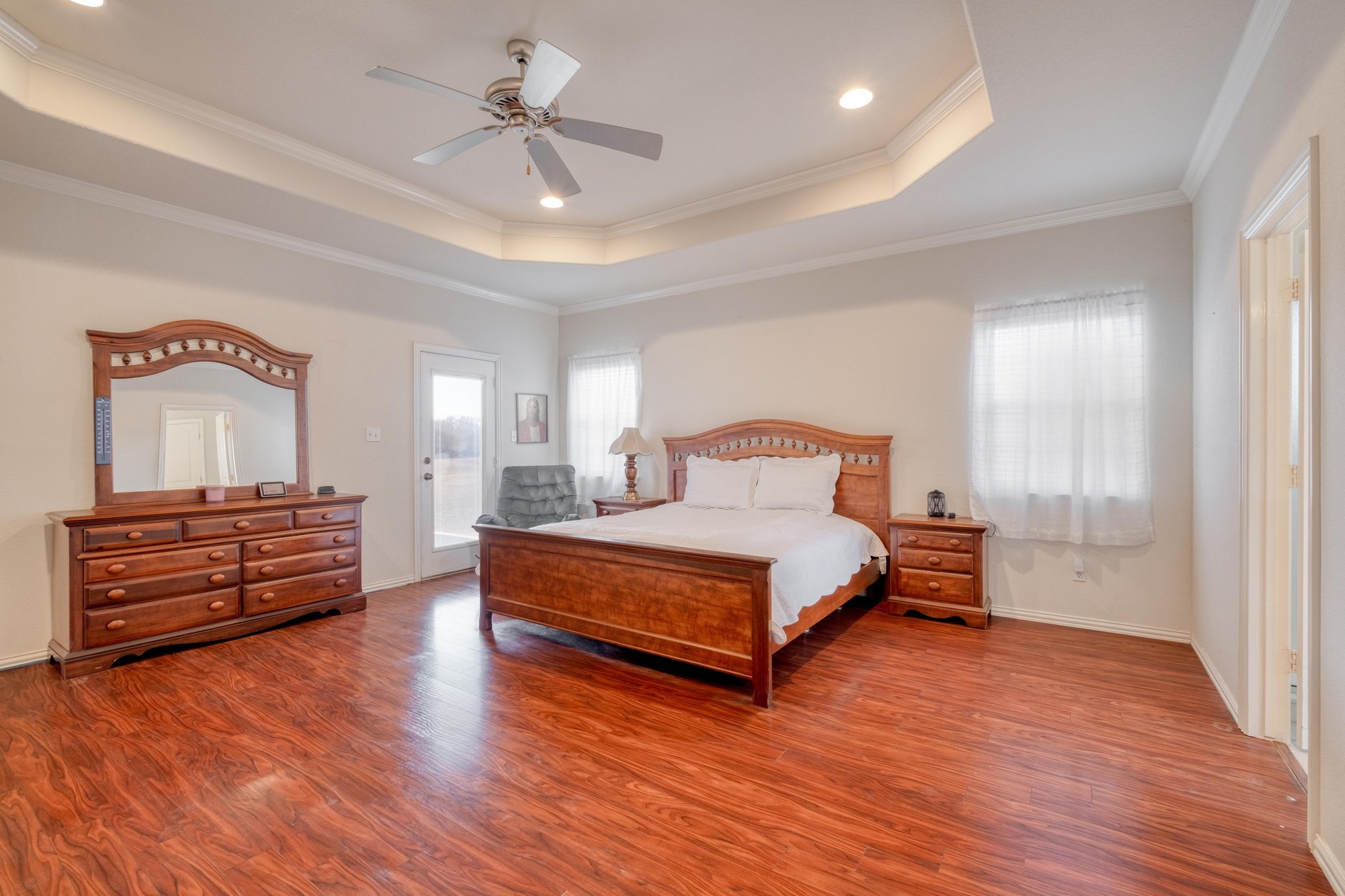 1949 Farm To Market Road 619 Elgin, TX 78621 - Photo 12 of 32 a bedroom with furniture and wooden floor