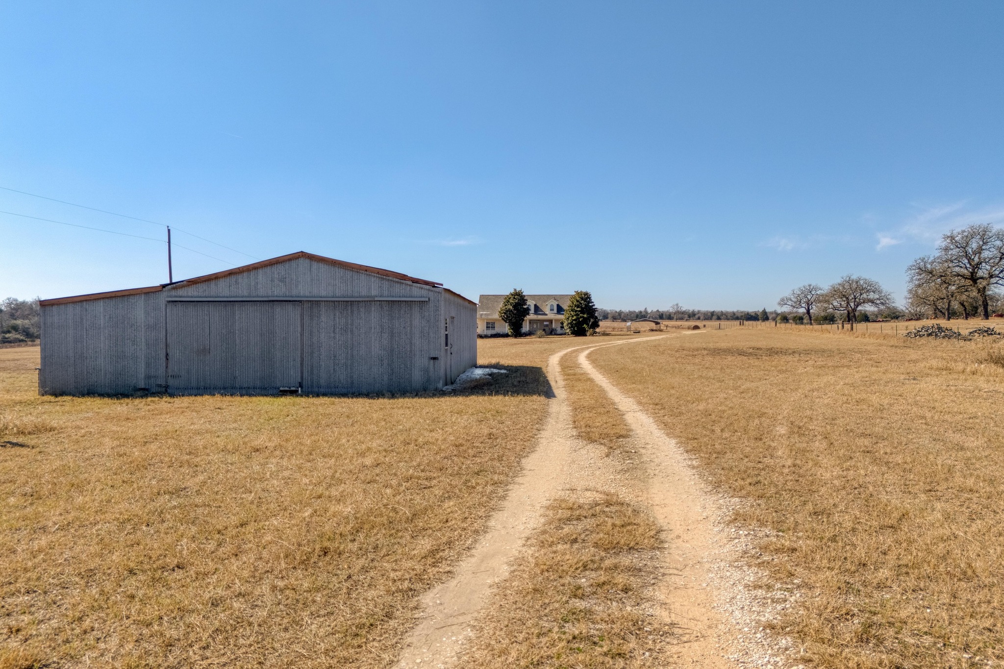 1949 Farm To Market Road 619 Elgin, TX 78621 - Photo 23 of 32 a street view with ocean view