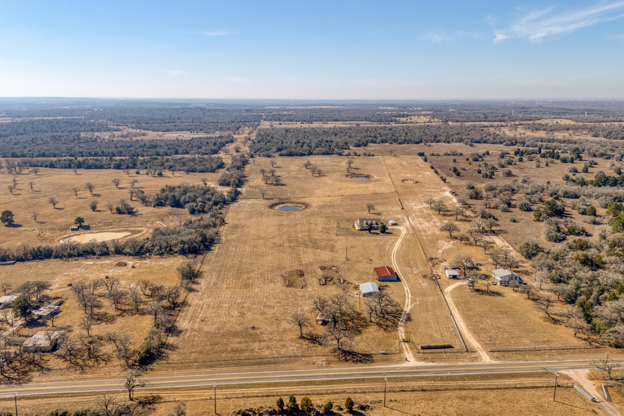 1949 Farm To Market Road 619 Elgin, TX 78621 - Photo 26 of 32 an aerial view of house with yard